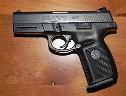 Image result for Smith and Wesson Sigma 9Mm