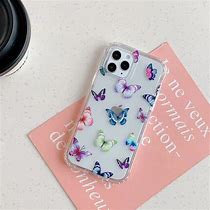 Image result for iPhone 15 Pro White with Butterfly Phone Case