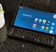 Image result for Touch Screen Keyboard with Slide Out Keyboard Phone