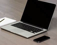 Image result for Apple iPhone and Laptop