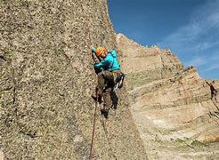 Image result for Man Climbing Mountain