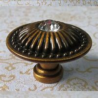 Image result for Glass and Brass Cabinet Knobs