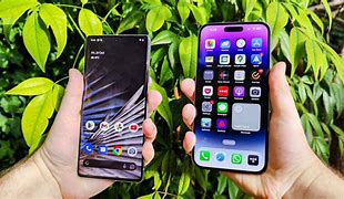 Image result for iPhone 12 Mini vs Pixel 8