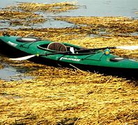 Image result for Pelican Bandit NXT 100 Kayak, Fade Red Yellow