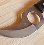 Image result for Knife with Finger Hole in Handle