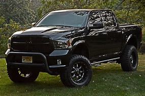 Image result for Ram 1500 with 4 Inch Lift with 35 Inch Toyo Tires