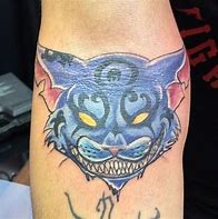 Image result for Evil Cheshire Cat Tattoo