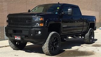 Image result for Silver 2015 Chevy Silverado 2500HD Lifted