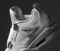 Image result for Real Red Jordan 4 Toro