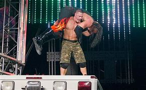 Image result for WWE John Cena vs Kane Ambulance Match