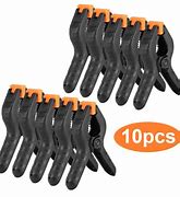 Image result for Long Plastic Spring That Clips From Knife to Case