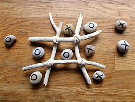 Image result for Naughts and Crosses Pebble Game DIY