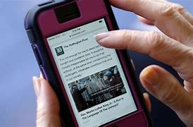 Image result for Reading News On Phone