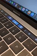 Image result for MacBook Air with Touch Bar