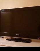 Image result for Sharp TVs with Button at Top