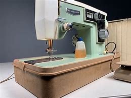 Image result for Dressmaker Deluxe Zig Zag Sewing Machine