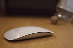Image result for Apple Magic Mouse Charging Dock