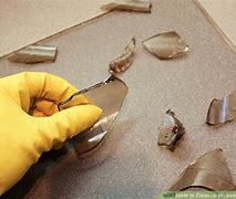 Image result for Cleaning Up Broken Glass