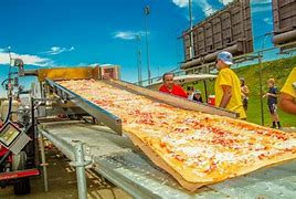 Image result for Airack Pizza World's Larhgest Pizza
