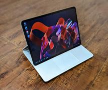 Image result for Microsoft Surface Laptop Pink
