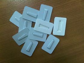 Image result for Strong Self Adhesive Clothes Clips for Walkie