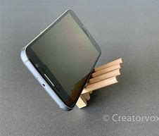 Image result for Lazy Boy Chair Phone Holder