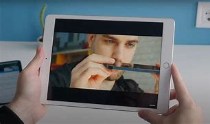 Image result for iPad Playing. Movie