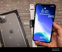 Image result for Holding iPhone 11 Pro Max