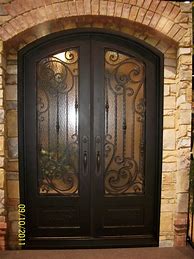 Image result for Rustic Front Doors with Wrought Iron