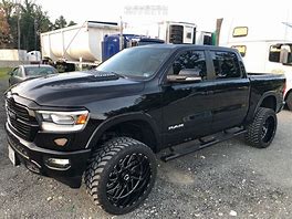 Image result for Blacked Out Dodge Ram 1500 Lifted