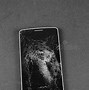 Image result for A Picture of a Person Holding a Cracked Phone
