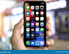 Image result for Hand Holding iPhone X