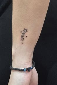 Image result for Shooting Star Tattoo Designs