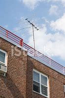 Image result for Old TV Antenna On Apartment