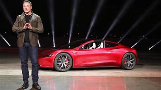 Image result for Elon Musk with Tesla