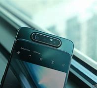 Image result for Phone with Camera That Pops Out of the Back