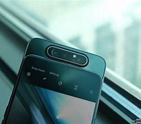Image result for Samsung Flip Phone with Rotating Camera