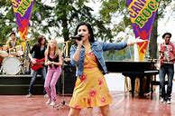 Image result for Demi Lovato in Camp Rock Purple Shirt