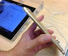 Image result for iPhone 6 Plus Gold in Hand