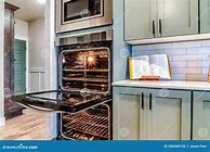 Image result for Microwave Oven Inside Cabinet