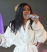 Image result for Cardi B Costume Rips On Stage