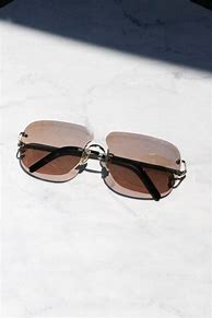 Image result for Cartier Rimless Sunglasses