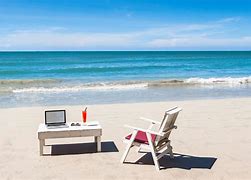 Image result for Working On Computer at Beach