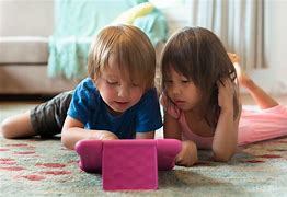 Image result for Kid Playing Games On iPad