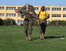 Image result for Fireman Carry Marine