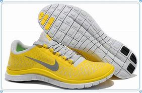 Image result for Nike Orange Free Run Running Shoes