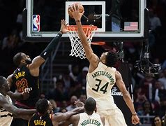Image result for Giannis Antetokounmpo Dunking On Someone