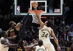 Image result for Giannis Antetokounmpo Dunking On Someone