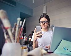 Image result for Employee On Cell Phone at Work