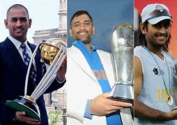 Image result for Dhoni with Trophy